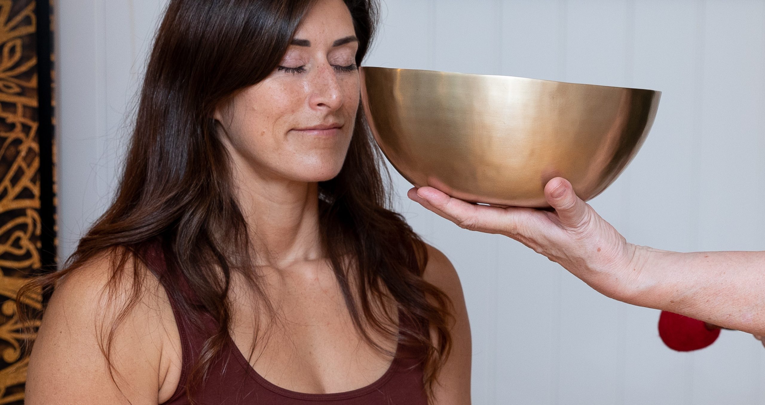 Woman having vibroacoustic massage treatment