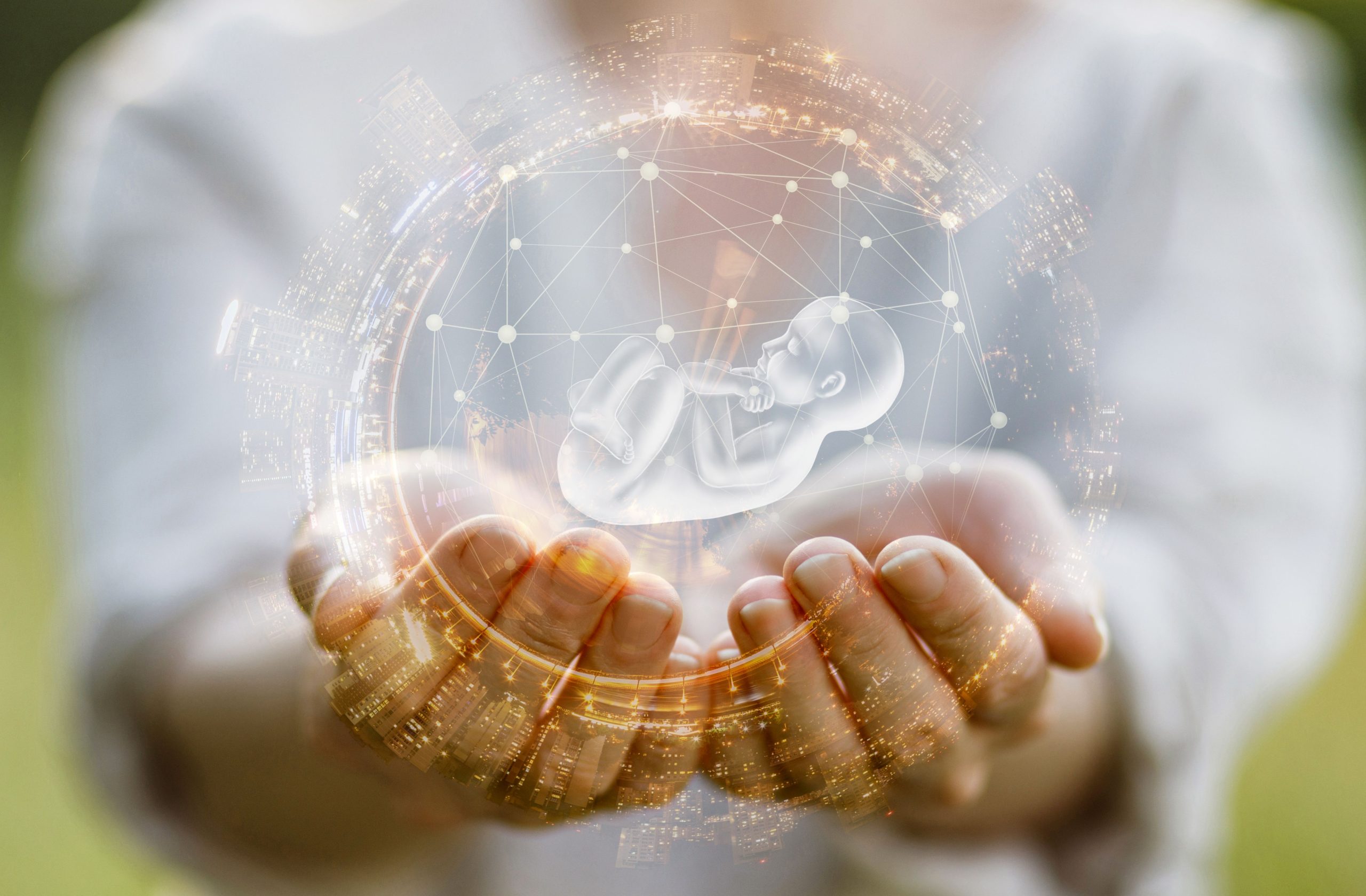 Imager relating to fertility with a woman holding an image of a baby in a bubble